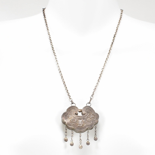 178 - A Qing dynasty silver Chinese amulet necklace. The necklace traditionally given to babies at 100 day... 