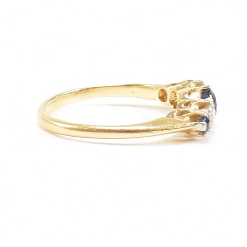 18 - An 18ct gold sapphire and diamond five stone ring. Estimated diamond weight 0.20ct. Weight 2.6g. Siz... 