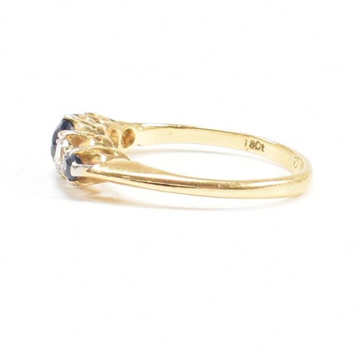 18 - An 18ct gold sapphire and diamond five stone ring. Estimated diamond weight 0.20ct. Weight 2.6g. Siz... 