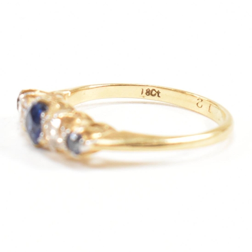 18 - An 18ct gold sapphire and diamond five stone ring. Estimated diamond weight 0.20ct. Weight 2.6g. Siz... 