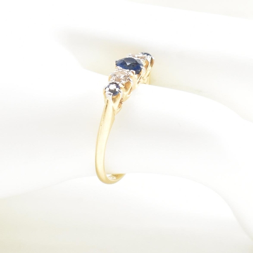 18 - An 18ct gold sapphire and diamond five stone ring. Estimated diamond weight 0.20ct. Weight 2.6g. Siz... 