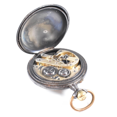 186 - A  large Swiss erotic open face crown wind pocket watch. The painted dial depicting figures in a bed... 