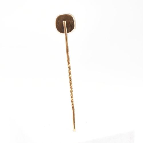 19 - A 18th century Georgian gold black dot quartz stick pin. The stick pin mounted with a collet set qua... 