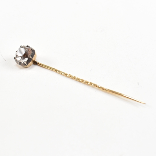 19 - A 18th century Georgian gold black dot quartz stick pin. The stick pin mounted with a collet set qua... 