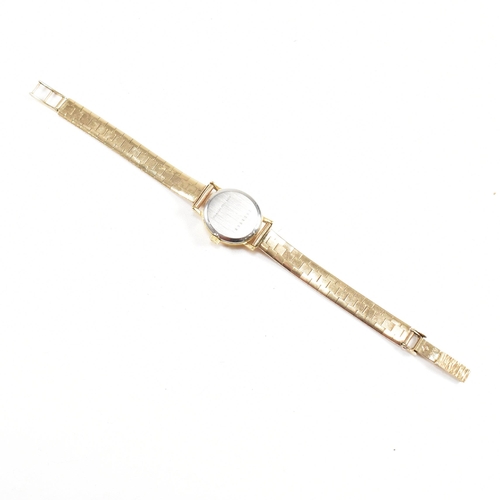 202 - A Longines wrist watch on a hallmarked 9ct gold strap. The Longines watch having a champagne dial wi... 