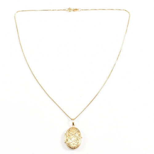 204 - A hallmarked 9ct gold locket pendant necklace. The locket having flower decoration strung on a fine ... 