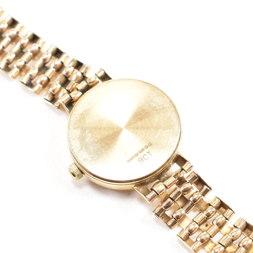 207 - 9ct Accurist gold ladies dress watch. The watch set with champagne roundel dial to 9ct bracelet stra... 