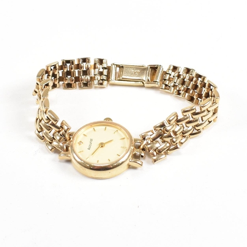 207 - 9ct Accurist gold ladies dress watch. The watch set with champagne roundel dial to 9ct bracelet stra... 