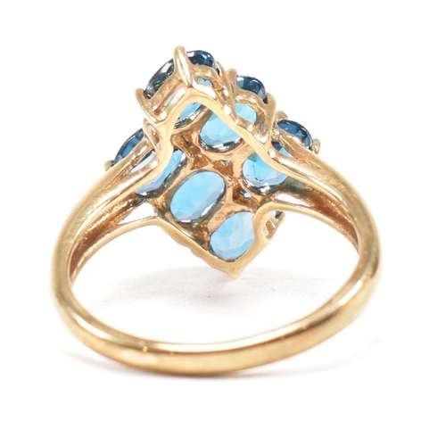 21 - A hallmarked 9ct gold and topaz cluster ring. Head measures 1.5cm. Weight 3.5g. Size O.5. All weight... 