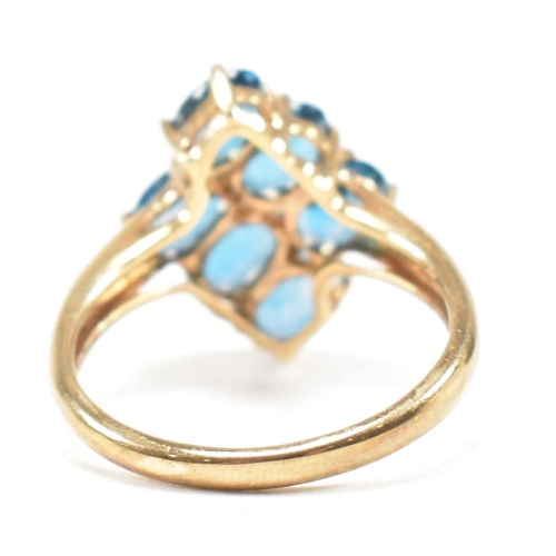 21 - A hallmarked 9ct gold and topaz cluster ring. Head measures 1.5cm. Weight 3.5g. Size O.5. All weight... 