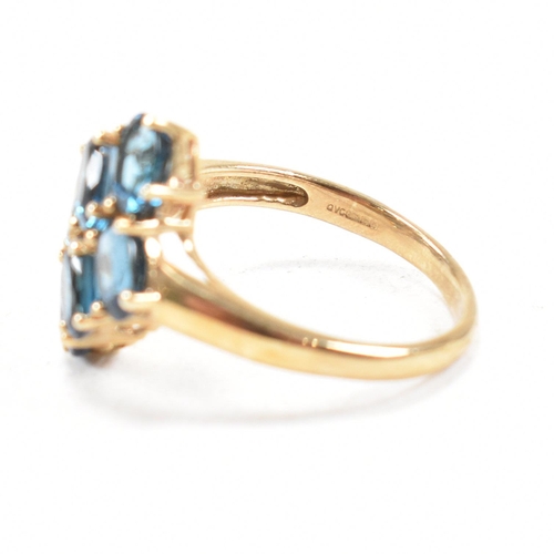 21 - A hallmarked 9ct gold and topaz cluster ring. Head measures 1.5cm. Weight 3.5g. Size O.5. All weight... 