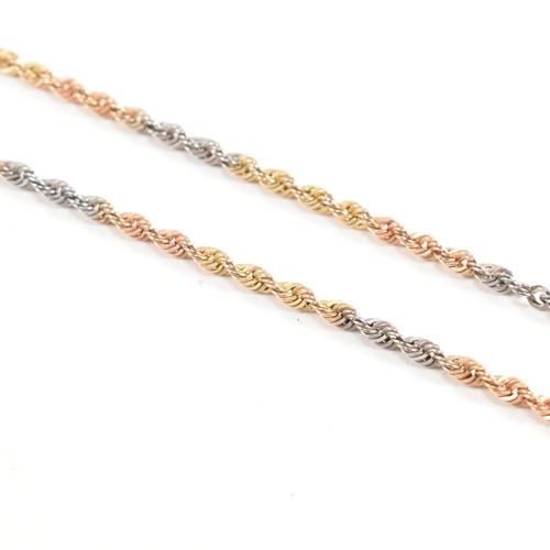 218 - A hallmarked 9ct gold tri colour rope twist chain necklace. Weight 2.5g. Measures 50cm. All weights,... 