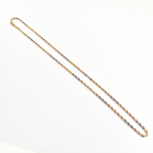 218 - A hallmarked 9ct gold tri colour rope twist chain necklace. Weight 2.5g. Measures 50cm. All weights,... 