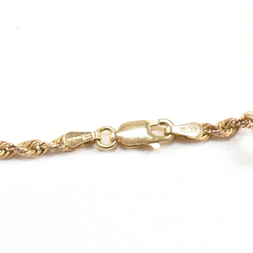 218 - A hallmarked 9ct gold tri colour rope twist chain necklace. Weight 2.5g. Measures 50cm. All weights,... 