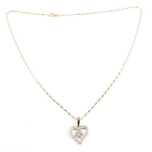 223 - A hallmarked 9ct gold pendant necklace. The necklace strung with a heart pendant on a fine link chai... 