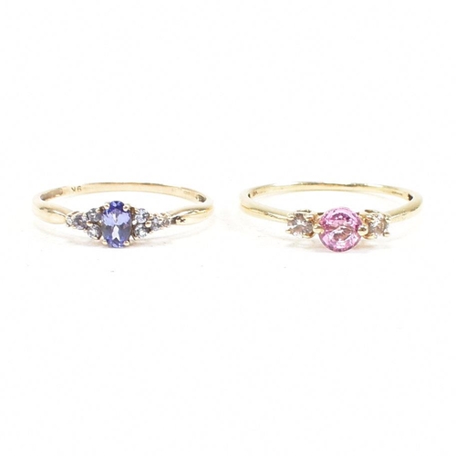 226 - Two hallmarked 9ct gold gem set rings. A synthetic sapphire and topaz ring and a tanzanite and diamo... 