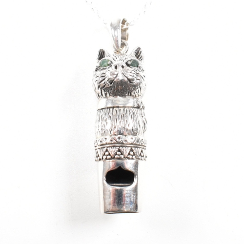 237 - A contemporary 925 Sterling silver cat whistle pendant necklace. The cat having emeralds set to eyes... 