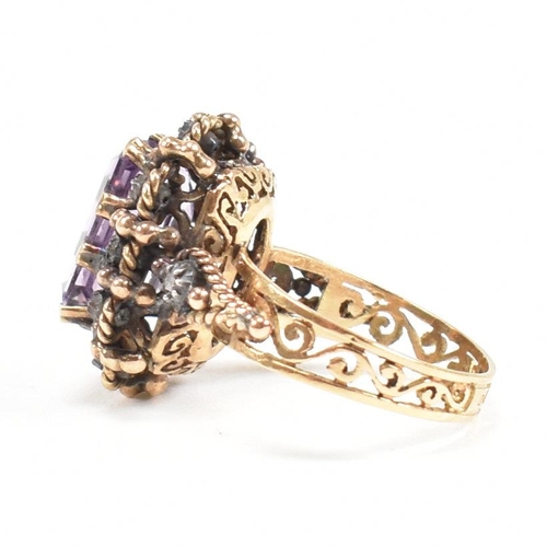 24 - Continental 18ct gold amethyst and diamond dress ring. The ring set with a large step cut amethyst f... 