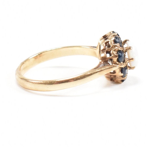 242 - A gold sapphire and opal cluster ring. Marks rubbed tests as 9ct gold. Weight 2.6g. Size N. All weig... 