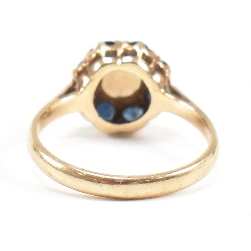 242 - A gold sapphire and opal cluster ring. Marks rubbed tests as 9ct gold. Weight 2.6g. Size N. All weig... 