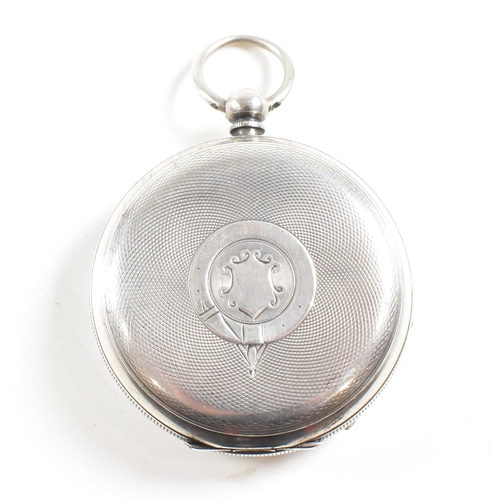 243 - An open faced silver 925 pocket watch  Stamped 925  with inset key wind movement and bale atop. Enam... 