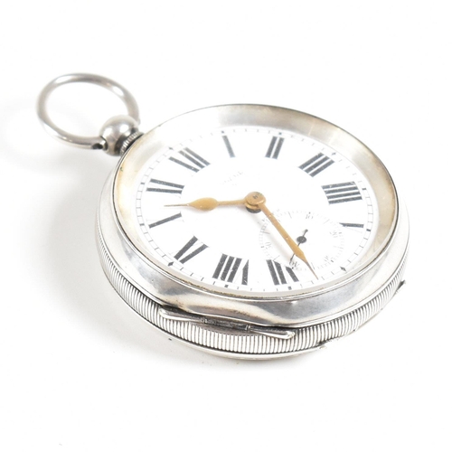 243 - An open faced silver 925 pocket watch  Stamped 925  with inset key wind movement and bale atop. Enam... 