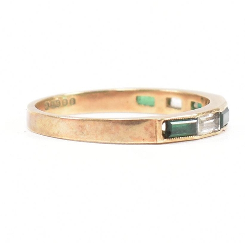 244 - A hallmarked 9ct gold synthetic spinel half hoop ring. The ring set with white and green baguette cu... 