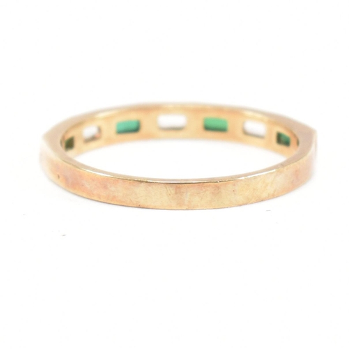 244 - A hallmarked 9ct gold synthetic spinel half hoop ring. The ring set with white and green baguette cu... 