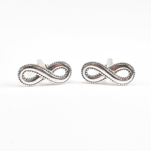 250 - A contemporary pair of 925 silver lucky eight cufflinks. Stamped 925. Weight approx 7.5g. Measures a... 