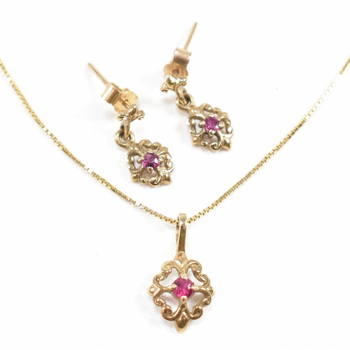 252 - A hallmarked 9ct gold and ruby pendant necklace and earring suite. Pendant hallmarked. Chain measure... 