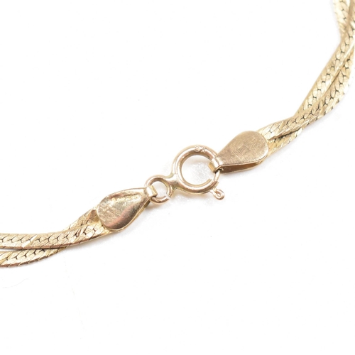 254 - A hallmarked 9ct gold flat snake chain bracelet. Weight 1.8g. Measures 17.5cm. All weights, measurem... 