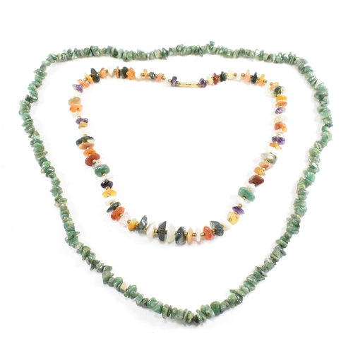 255 - An assortment of vintage bead necklaces. The necklaces to include agate, garnet, amethyst, citrine, ... 