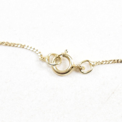 256 - A 9ct gold chain necklace strung with a hallmarked gem set heart pendant. Weight 1.8g. Measures chai... 