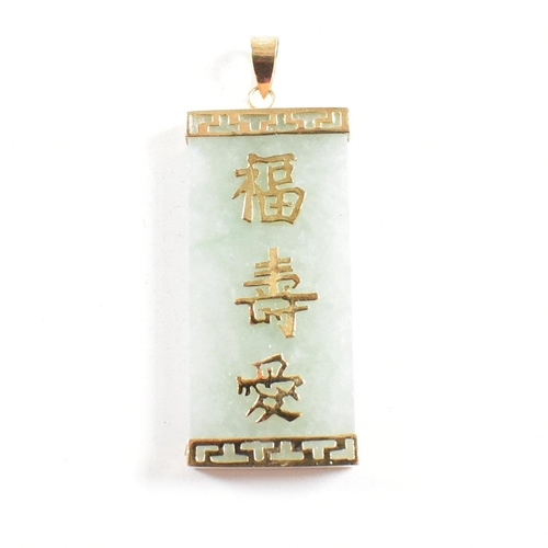 258 - A 14ct gold mounted jade pendant. The pendant having Chinese script - happiness, longevity and love ... 