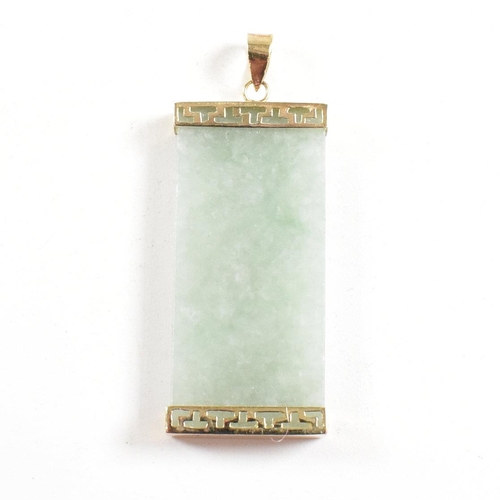 258 - A 14ct gold mounted jade pendant. The pendant having Chinese script - happiness, longevity and love ... 