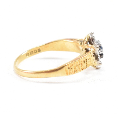 26 - A hallmarked 18ct gold sapphire cluster ring. The ring hallmarked London. Weight 3.5g. Size N. All w... 