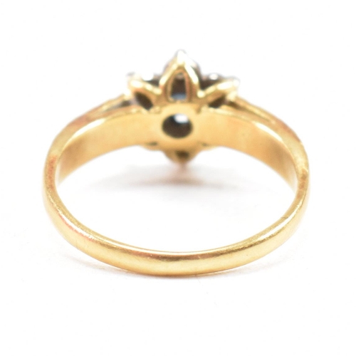 26 - A hallmarked 18ct gold sapphire cluster ring. The ring hallmarked London. Weight 3.5g. Size N. All w... 