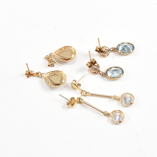 261 - Three pairs of 9ct gold gem set pendant earrings. The earrings set with CZ, crystal, and topaz. Tota... 