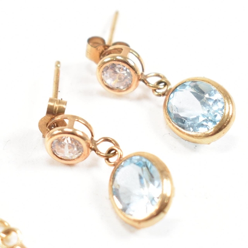 261 - Three pairs of 9ct gold gem set pendant earrings. The earrings set with CZ, crystal, and topaz. Tota... 