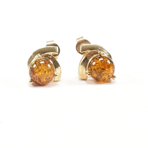 272 - 9ct gold and amber earrings and a tanzanite pendant. The earrings hallmarked for Birmingham. Measure... 