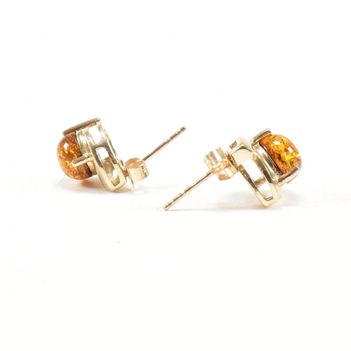 272 - 9ct gold and amber earrings and a tanzanite pendant. The earrings hallmarked for Birmingham. Measure... 