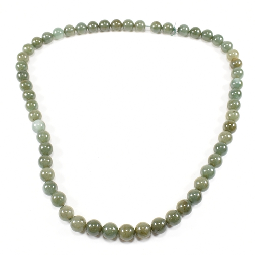 279 - A vintage nephrite bead necklace. Measures 72cm. Beads approx 10mm each. All weights, measurements a... 