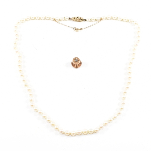 28 - A hallmarked 9ct gold and cultured pearl necklace and an early 20th century diamond set 9ct gold but... 