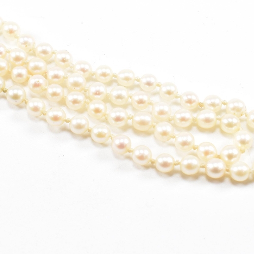 28 - A hallmarked 9ct gold and cultured pearl necklace and an early 20th century diamond set 9ct gold but... 