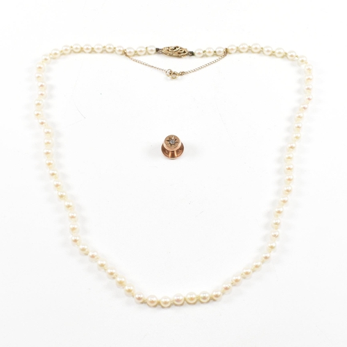 28 - A hallmarked 9ct gold and cultured pearl necklace and an early 20th century diamond set 9ct gold but... 