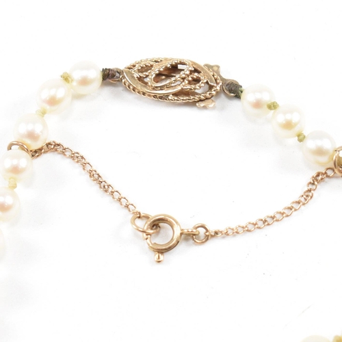 28 - A hallmarked 9ct gold and cultured pearl necklace and an early 20th century diamond set 9ct gold but... 