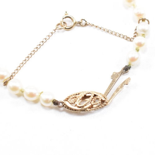 28 - A hallmarked 9ct gold and cultured pearl necklace and an early 20th century diamond set 9ct gold but... 