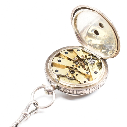 288 - A French silver 935 fob pocket watch. Key wind with gilded decorated enamel dial, Roman numeral chap... 