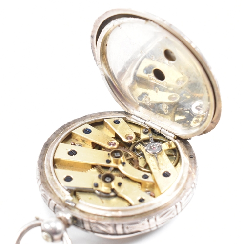 288 - A French silver 935 fob pocket watch. Key wind with gilded decorated enamel dial, Roman numeral chap... 