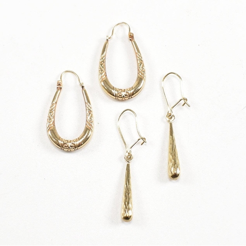 291 - Two pairs of yellow metal earrings. A Creole pair marked 375 to hook, a pendant drop pair unmarked. ... 